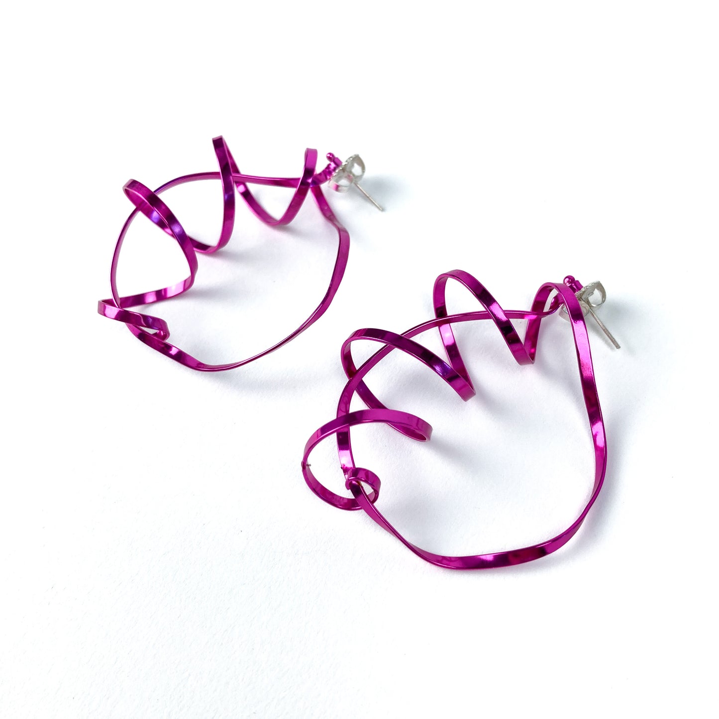 Fuchsia statement spiral hoops