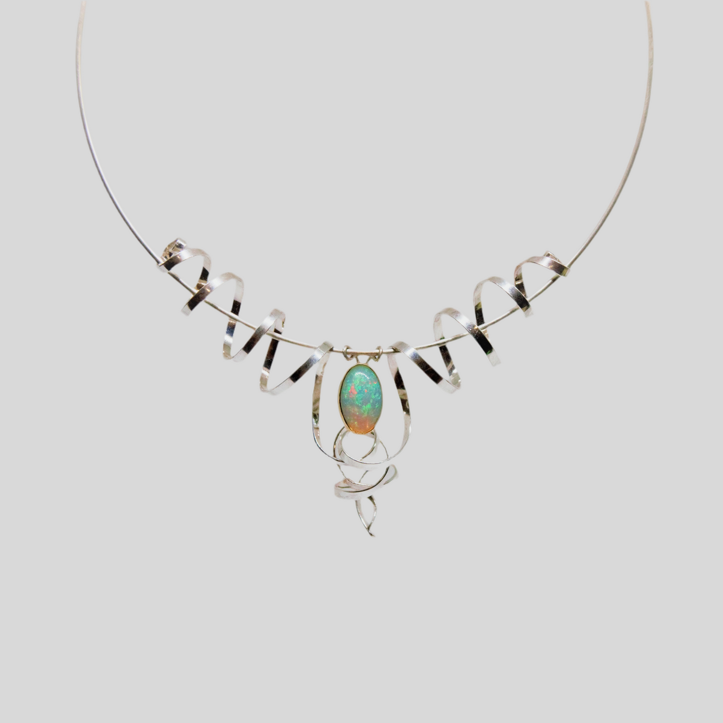 “Swirling enchantment” one of a kind opal neck piece