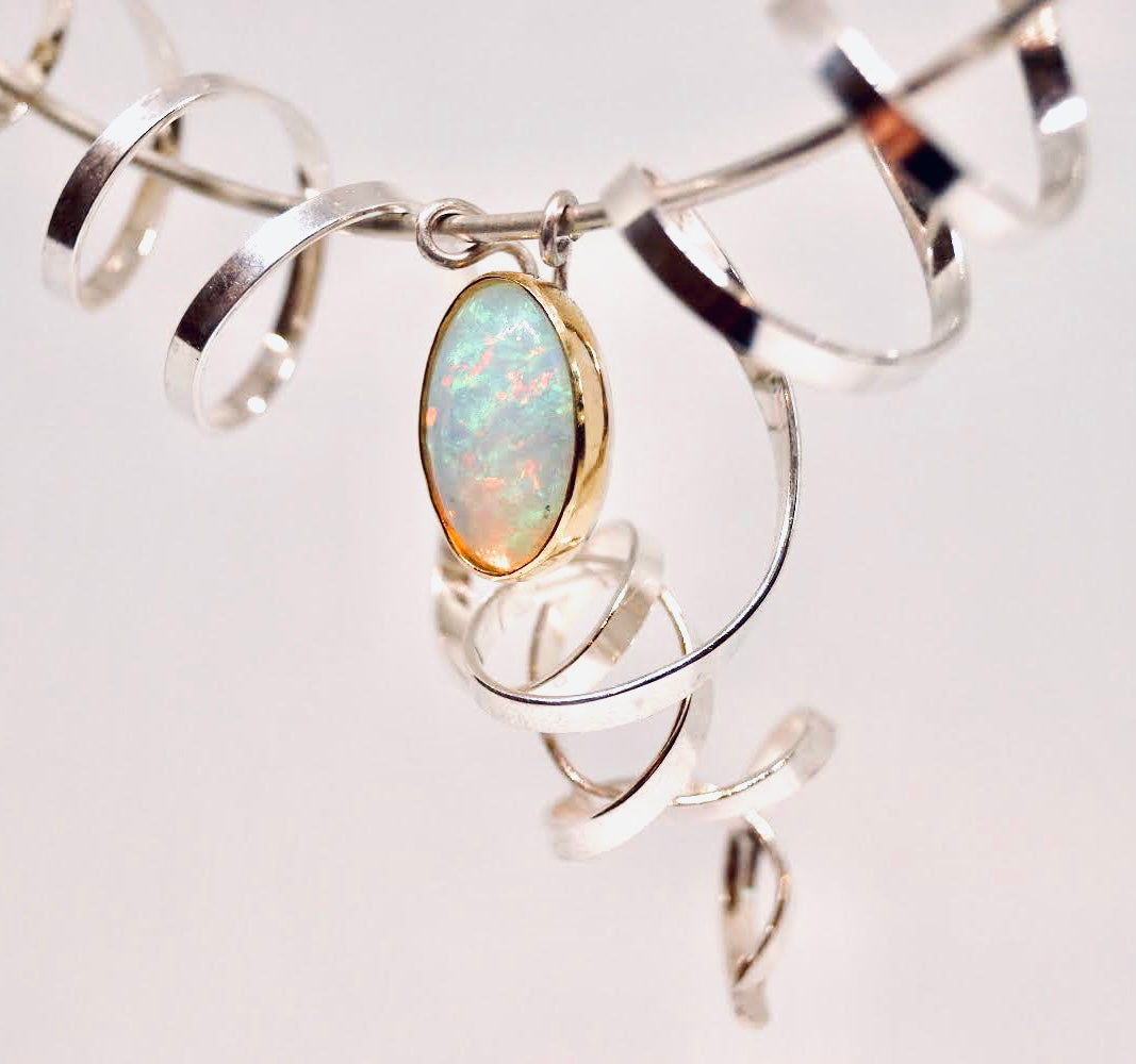“Swirling enchantment” one of a kind opal neck piece
