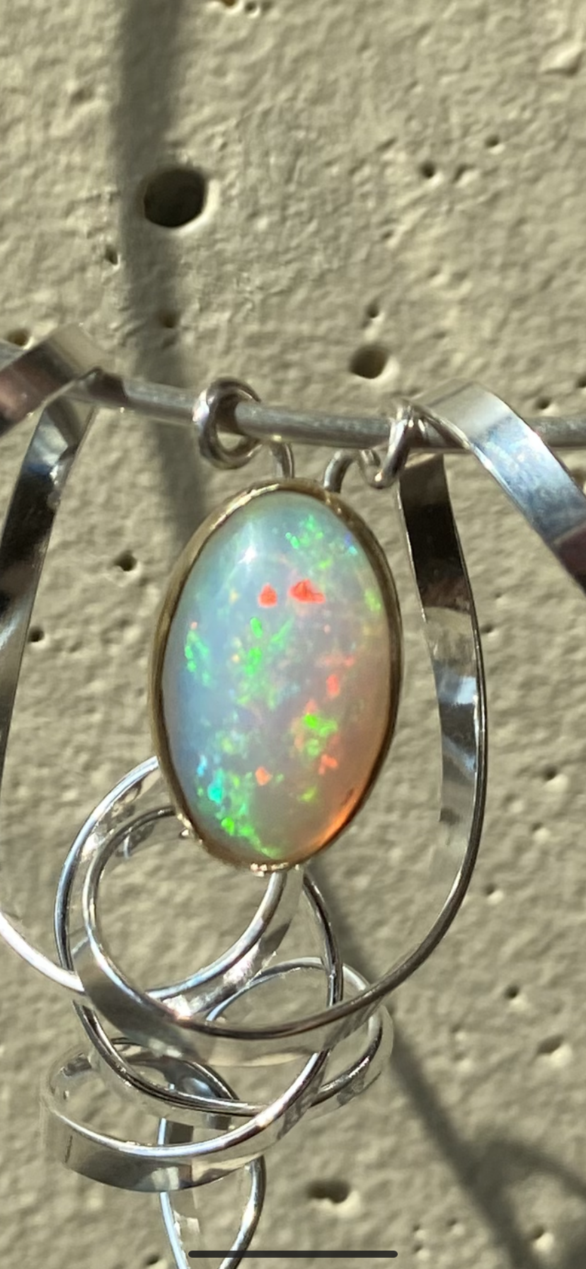 “Swirling enchantment” one of a kind opal neck piece