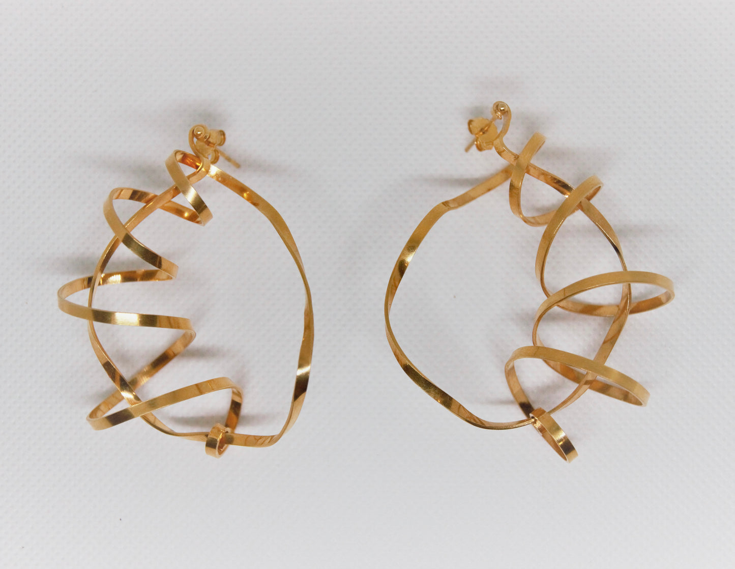 Gold plated hand fabricated sterling silver statement hoops
