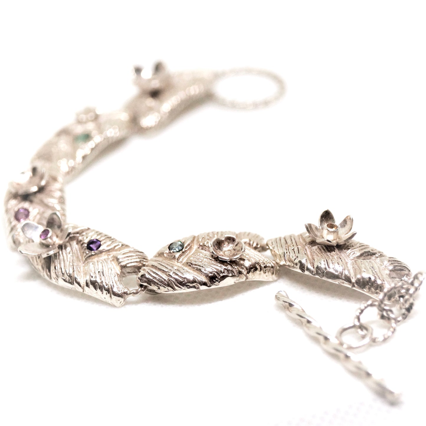 Sterling silver bracelet with flowers and gemstones